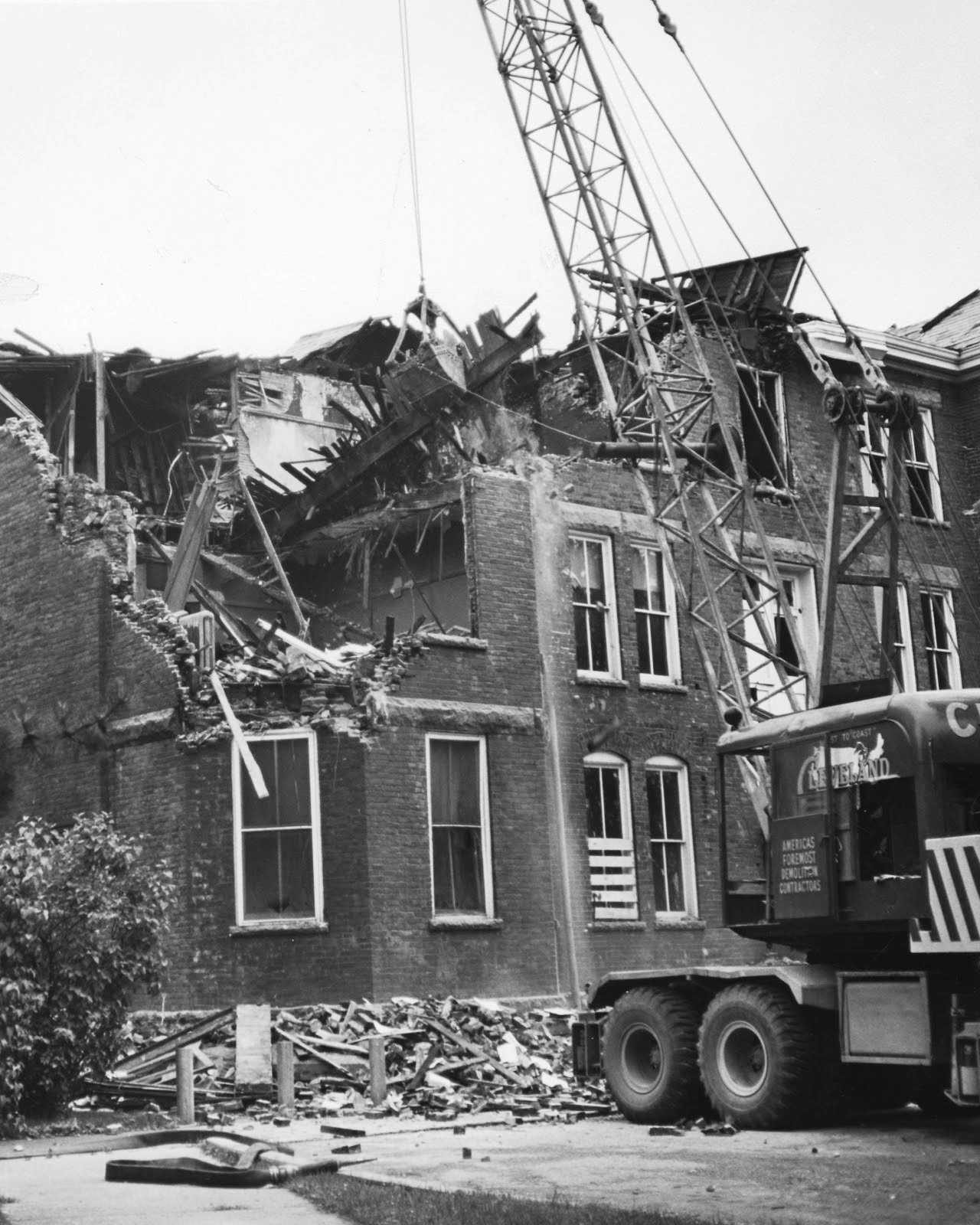 On Jan. 9, 1961 fire swept through the 71-year-old Neville Hall. Seventy students and 10 faculty members were in the building and all got out safely. The wood of the building burned away along with the research of many psychology graduate students. The building was so badly damaged by the fire that destruction was necessary. Photo of UK Special Collections. 