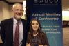 HDI director Harold Kleinert congratulated Ashley Candelaria Alumbaugh, who received the prestigious 2013 Anne Rudigier Award.